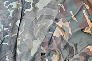 Camouflage background texture as backdrop for army and military design projects