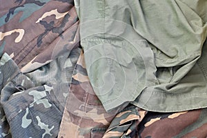 Camouflage background texture as backdrop for army and military design projects