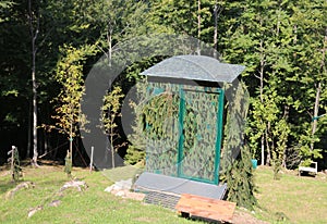 camouflage hunting lodge used by hunters to hide in the mountain