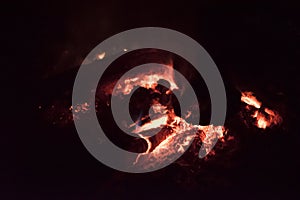 Camp fire , bonfire burning in dark