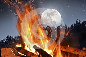 Camp fire in the moonlight
