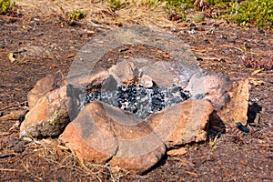 Camp Fire Rock Circle with Ash and Burned Wood