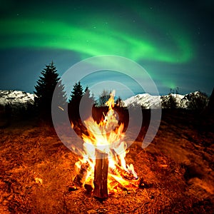 Camp Fire Watching Northern Lights