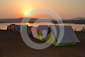Camp site sunset at river side