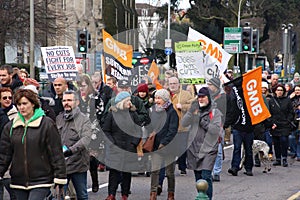 Campaigners march through Brighton, UK in protest against the planned cuts to public sector services. The march was organised by B