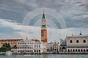 Campanile bell tower in dramatic view at San Marco square in Venice, Italy, summer time