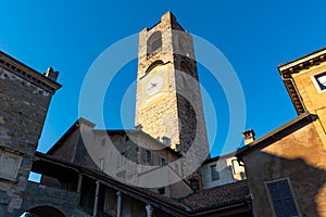 Campanone Civic Tower at main square Piazza Vecchia in Upper Medieval Town in Bergamo