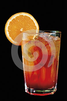 Campari and orange cocktail isolated on black background