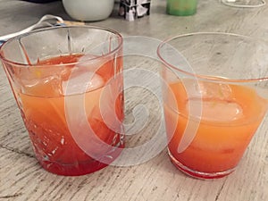 Campari Orange served in two crystal glass with ice cubes