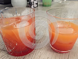 Campari Orange served in two crystal glass with ice cubes