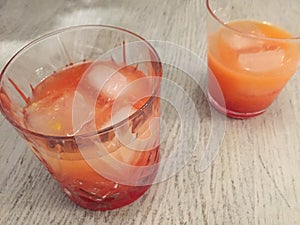 Campari Orange served in two crystal glass with ice cubes