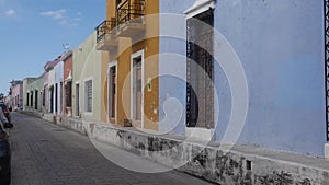 Campeche Mexico colourful street in town and decorative windows balconies