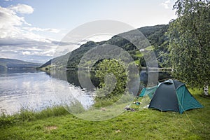 camped on the banks of a fjord