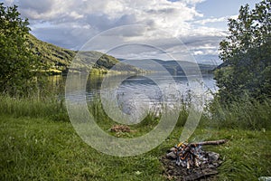 camped on the banks of a fjord