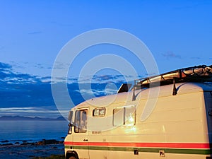 Camper car on beach, Lofoten islands, Norway