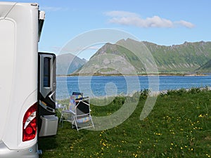 Camper car on beach, Lofoten islands, Norway