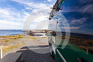 Camper car on norwegian sea coast