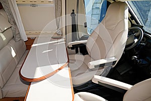 Camper Dining Room interior in front van seat vanlife and steering wheel