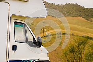 Camper in mountains nature