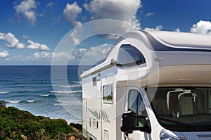 Camper parked on the beach at Buggerru, Sardinia,