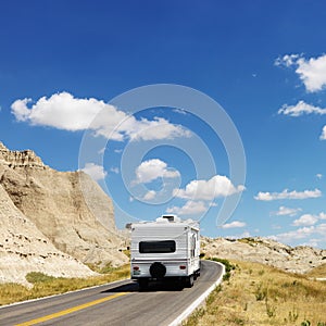 Camper on scenic road.