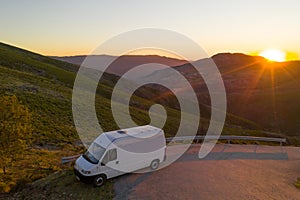 Camper van drone aerial view in Serra da Freita in Arouca Geopark at sunset, in Portugal