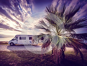 Camper van parked on a beach