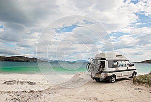 Camper van parked on a beach in the Isle of Lewis