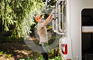 Camper Van RV Owner Preparing Bike Rack