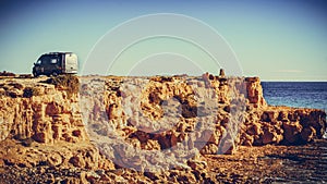 Camper van on sea cliff, camping