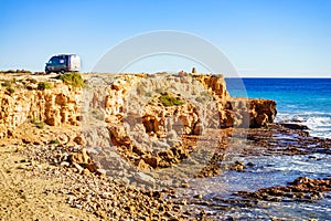 Camper van on sea cliff, camping