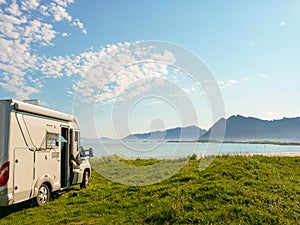 Camper van on sea shore, Lofoten Norway