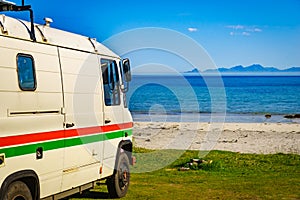 Camper van on sea shore, Lofoten Norway