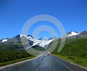 Campers Curving Toward Alaskan Glacier