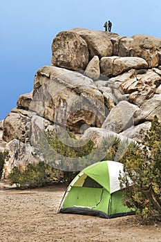 Campers Rock Climbing in Joshua Tree National Park