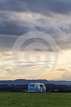 campervan german volkswagen at sundown landscape evening