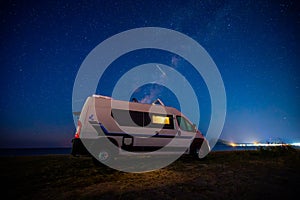 Campervan or motorhome parked on the beach in Greece