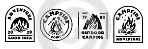 Campfire black labels. Adventure emblems with bonfires. Monochrome stickers. Tourist hiking elements. Forest and