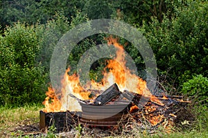 Campfire On Cottage Plot In Summer Outdoors