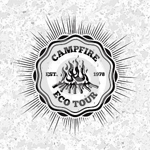 Campfire eco tour label with flaming fire on grunge background. Vector