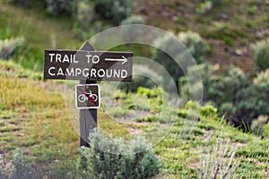 Campground trail sign on hiking path - Yellowstone National Park