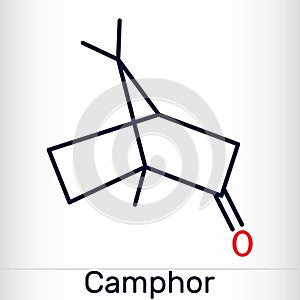 Camphor molecule. It is terpenoid and a cyclic ketone. Structural chemical formula and molecule model