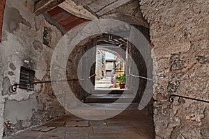 Campiglia d `Orcia, Siena, Tuscany, Italy: alley with underpass in the old town