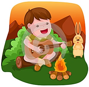 Camping boy playing guitar