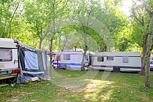 Camping camper camp green outdoor trees