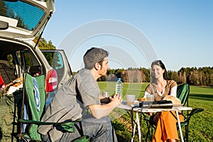 Camping car young couple enjoy picnic countryside