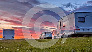 Camping caravans and cars  sunset