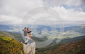 Camping couple in love. Couples of lovers tourists relax on nature. Camping trip with lovers.