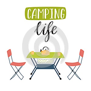 Camping folding table and chairs and handwritten words - Camping life.Tourist furniture for picnics, outdoor recreation, rest in