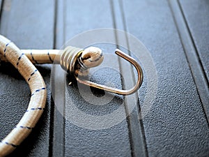 Camping gear: bungee cords on rugged black background